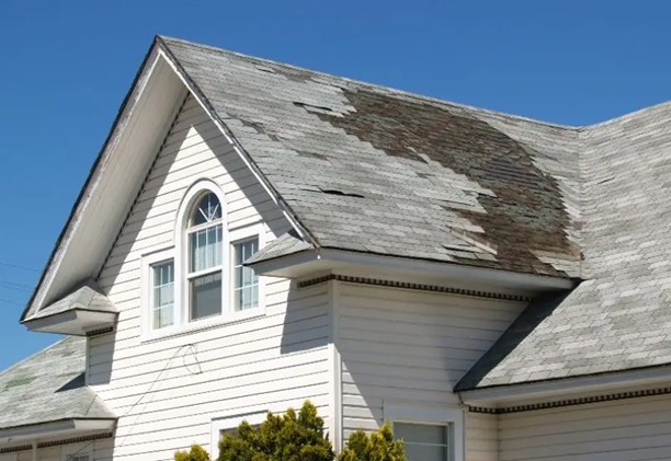 House roof after storm damage