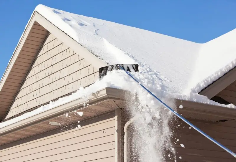 Removing snow from the roof