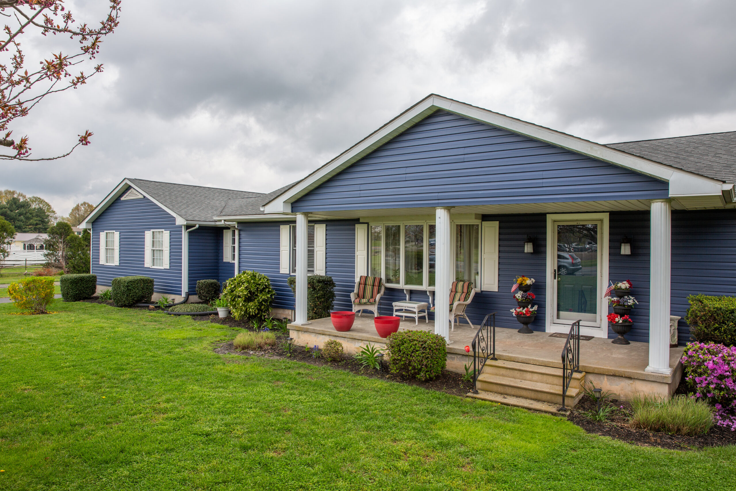 House with blue vinyl siding